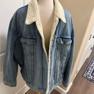 New like Levi's Blue Denim Jacket with Sherpa Lining.